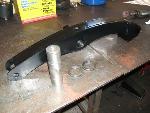 cantilever arm with solid machined bushing.