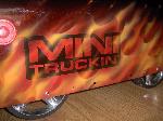 MT logo with real flames